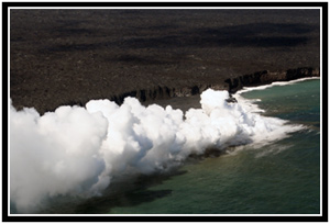 Strong wind pulls the steam along the shore.